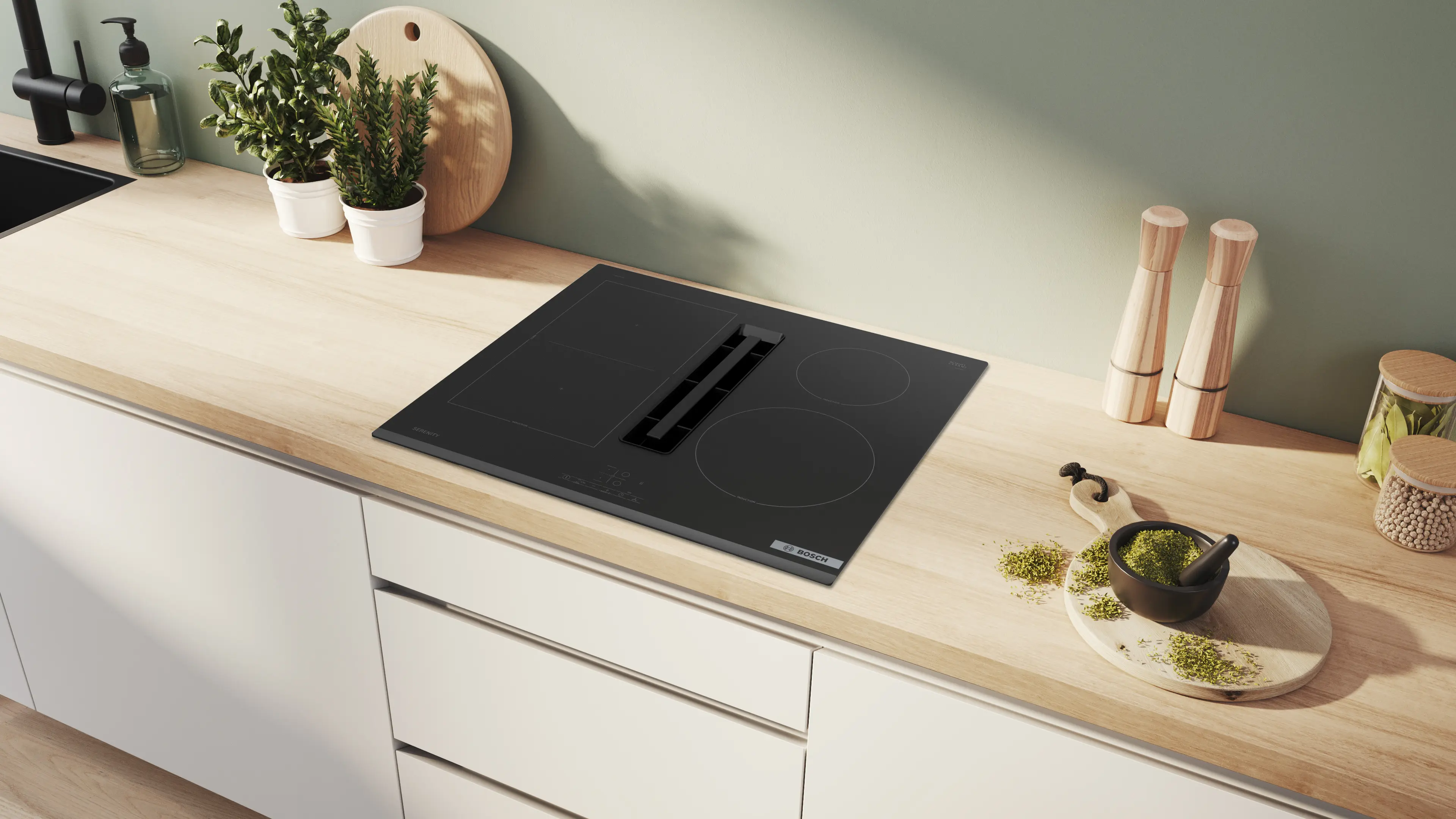 Une solution deux-en-un qui transforme la cuisine : plaque à induction avec hotte intégrée