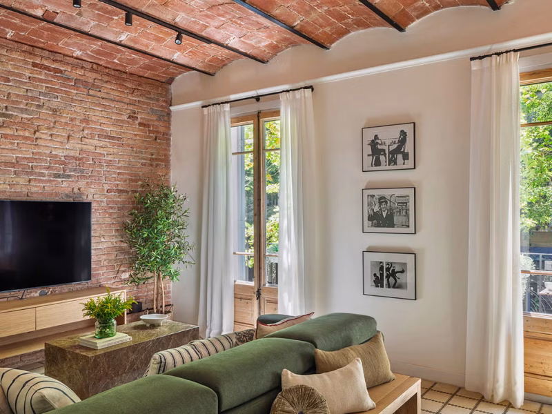 Magnifique Appartement barcelonais aux murs de briques apparentes